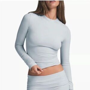 🪬NWT SKIMS Long Sleeve Cotton Jersey 
Size Small
Color Zen Blue🪬